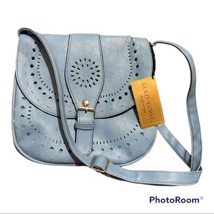 Gold Coast purse  Blue in color  Laser cut detail crossbody bag NWT